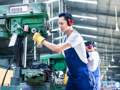 Electrician Working On Machine